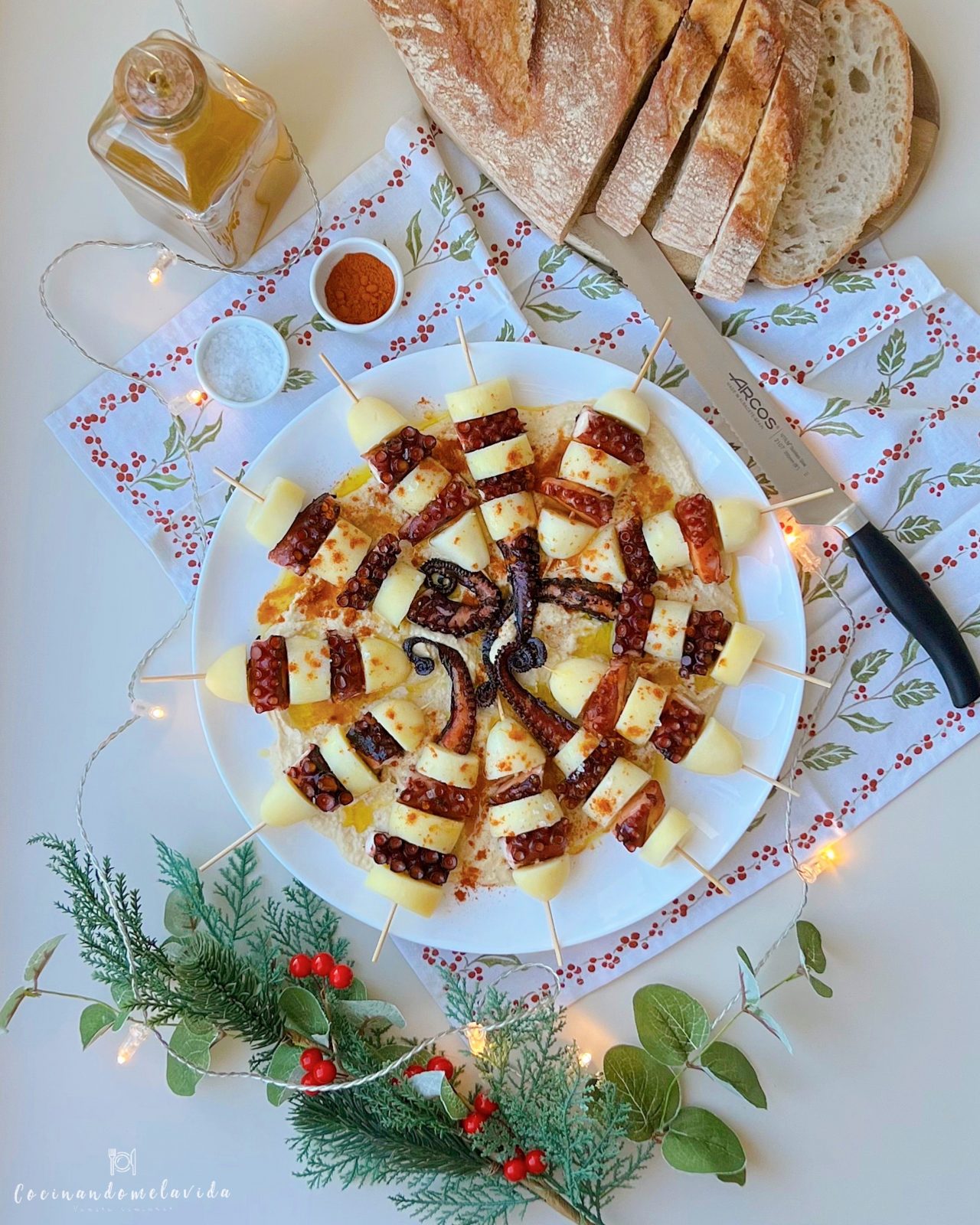 BROCHETAS DE PULPO CON PATATAS EN CAMA DE HUMMUS